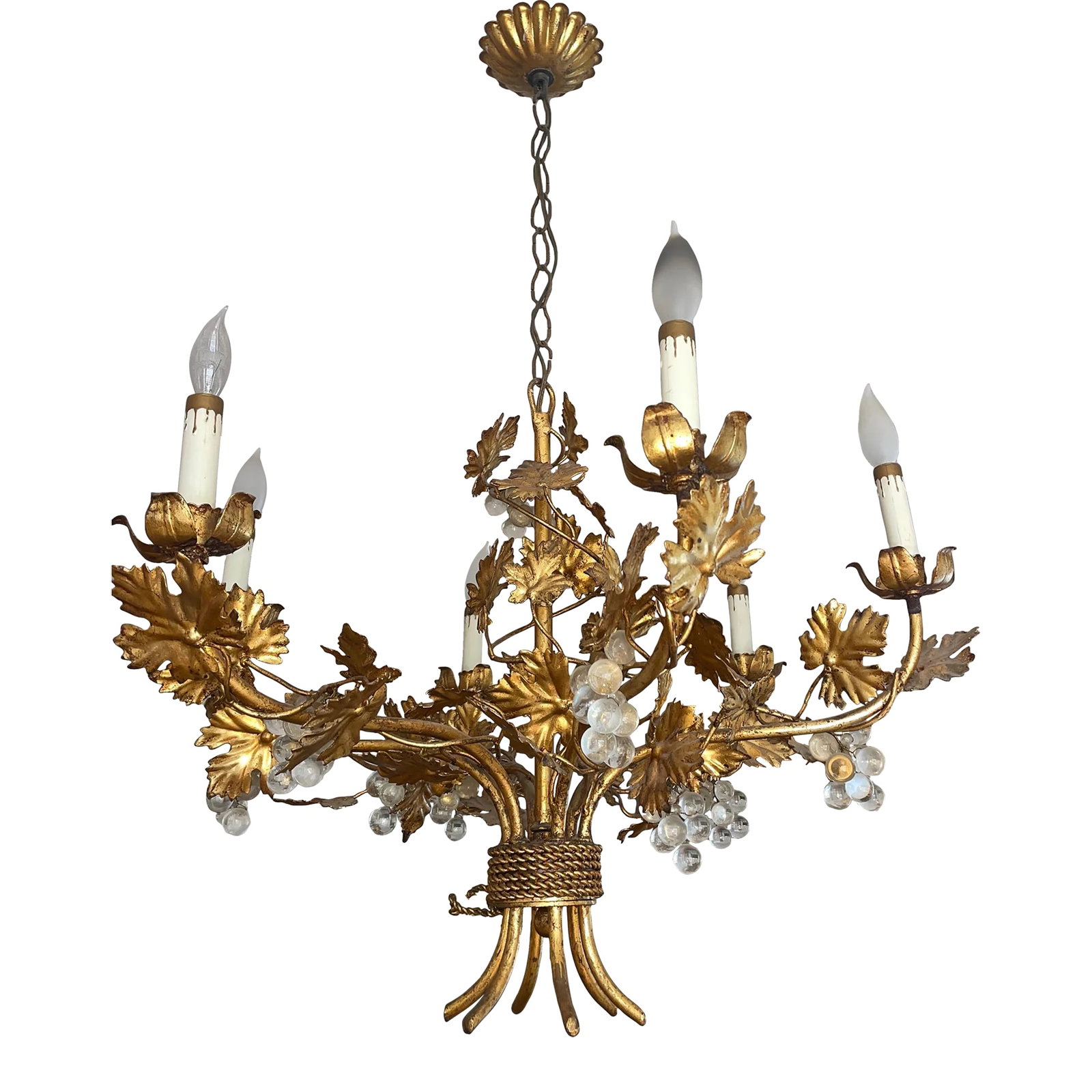 1960s Hollywood Regency Gilt Metal and Glass Grape and Vine Motif Chandelier, Italy: This stunning six light Italian gilded toleware chandelier features a birdcage design with a frame/arms surrounded with flourishes of gilt leaves and glass grape clusters Dimensions: 28 inches wide,