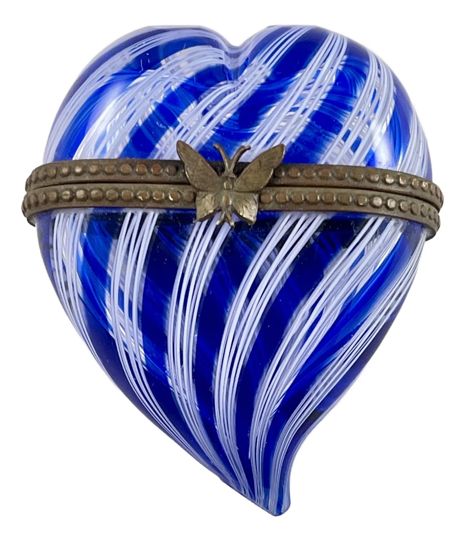 Murano Venetian Glass Latticino Heart Shaped Trinket Box: A lovely metal braced heart shaped Venetian glass trinket box, Murano, Italy, circa 1970s. A swirled cobalt blue and white glass box hand made in the process known as Latticino. The metal bracing show