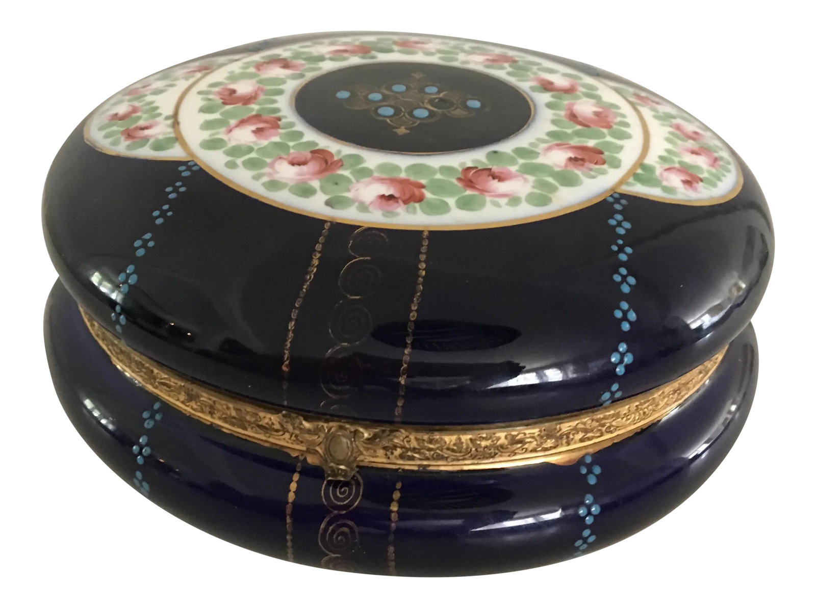 Antique Cobalt Blue French Porcelain Dresser Box: Stunning hand painted French dresser/ jewelry porcelain box with a hinged lid. It is a rich cobalt blue with hand painted pink and green flowers. It has light blue enamel, and gilt paint detail.