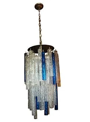 Mid - Century Murano Glass Cobalt Blue and Transparent Handblown Multi - Tier Tronchi Chandelier: Murano blown glass multi tier chandelier with handblown tubular pendants called "trochi". The pendants are textured and are in both transparent and cobalt blue providing this striking appearance. The 