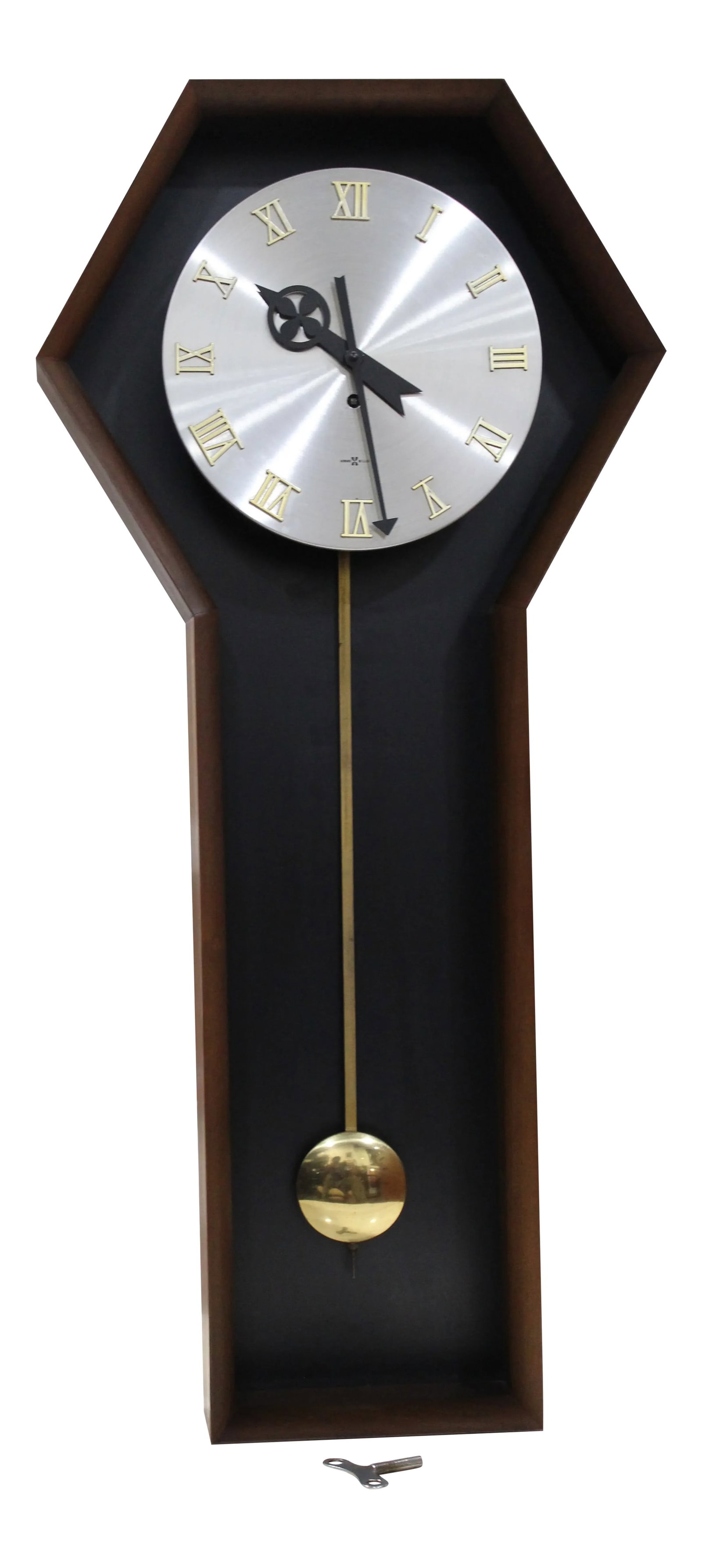 1970 Arthur Umanoff for Howard Miller Pendulum Coffin Clock #557: Rare Arthur Umanoff Pendulum Clock by Howard Miller - Model # 557 Discover the extraordinary craftsmanship of a truly unique timepiece - the Arthur Umanoff designed pendulum clock for Howard Miller.