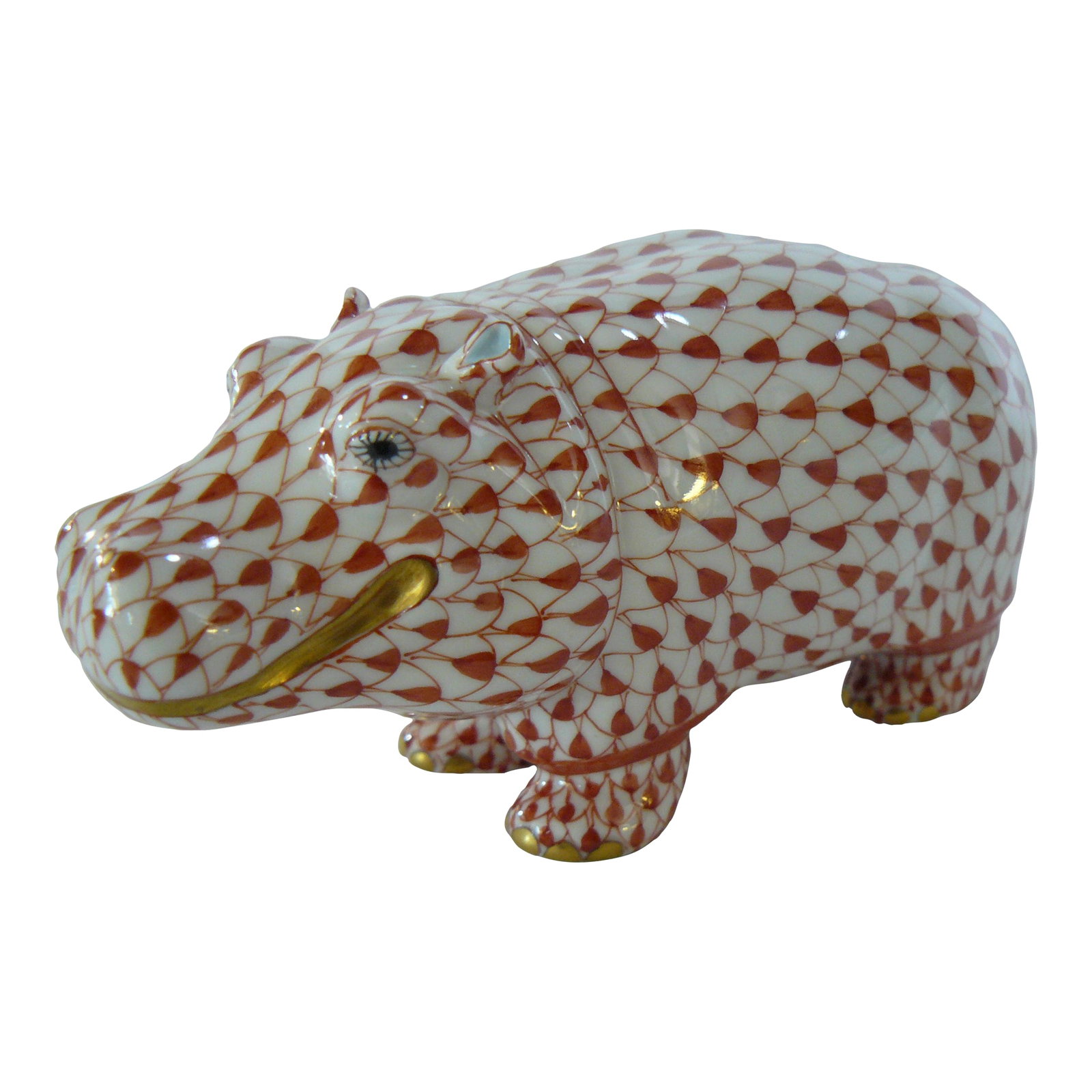 Herend Red Fishnet Handpainted Hippo: This Herend Hippo is painted in Vieux Herend (VH), the Red Fishnet design with gold accents and the palest blue ears. This piece is still in production and is listed for EUR399 on the Herend site.