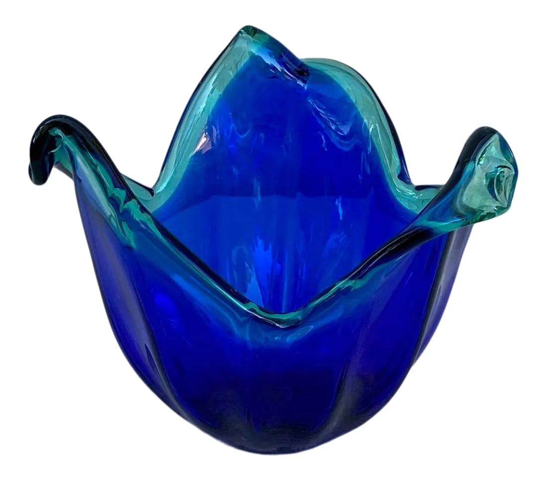 1960s Blue Murano With Teal Green Accents Vase: An interesting small Murano dish in a rich cobalt blue color having a lighter teal green variation at the top. The dish has stylized petal edges and has the original manufacturers label. Italian,