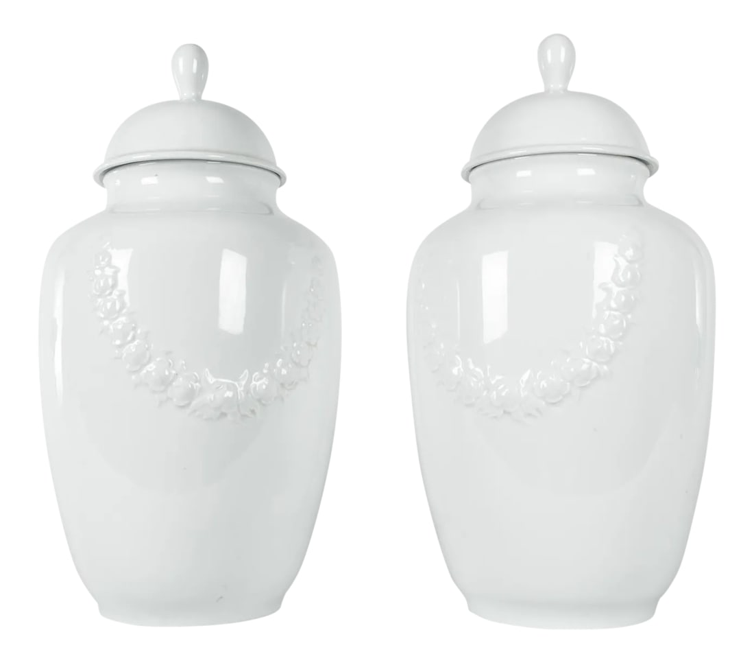 Vintage European Porcelain Urns - A Pair: Offering a pair of large vintage European glazed porcelain covered decorative urns. These pieces are in excellent condition and would bring a great addition to any space. Condition: Alterations: