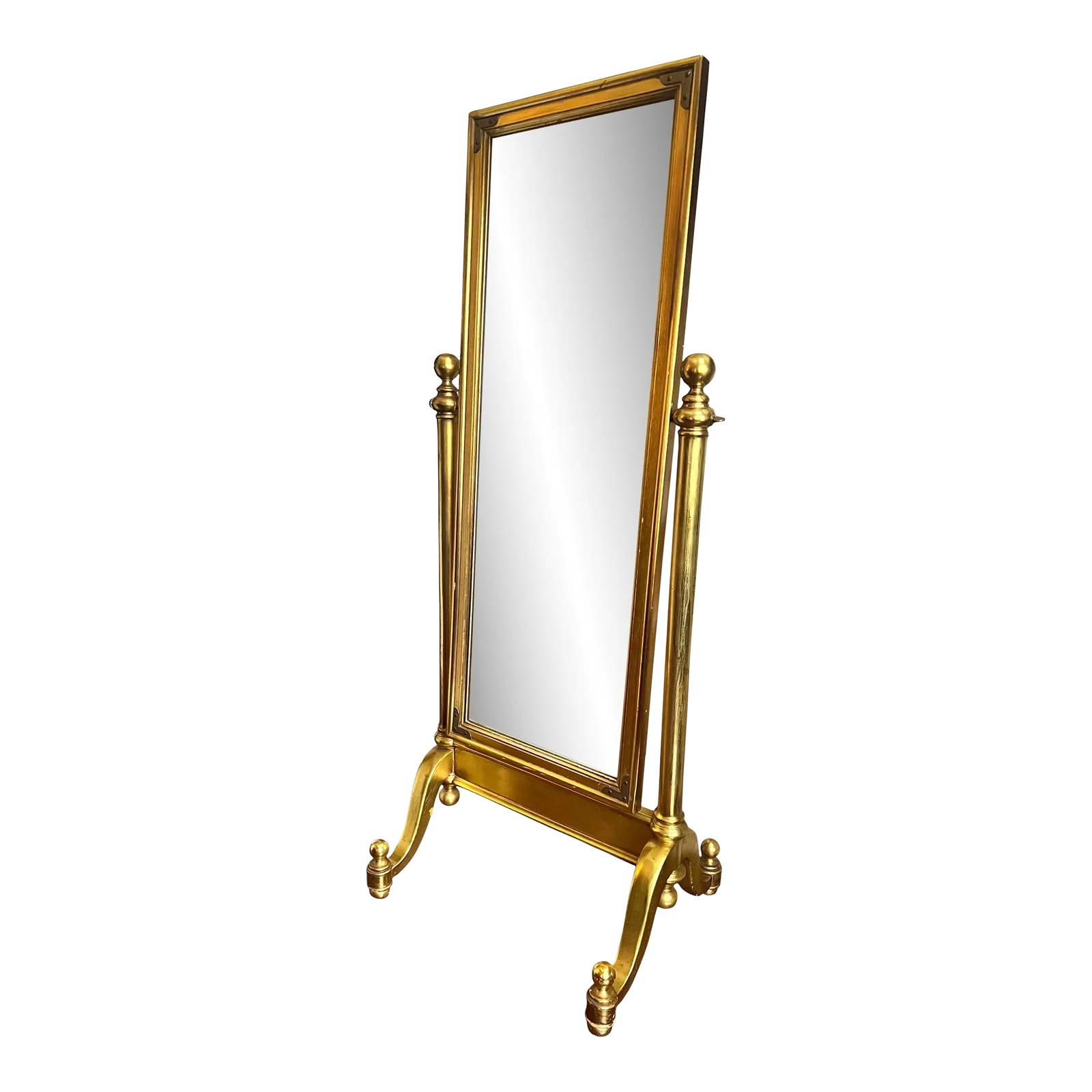 1970s Hollywood Regency Giltwood Cheval Floor Mirror: 1970s Hollywood Regency style giltwood cheval full-length floor mirror. A striking swivel mirror featuring a tailored rectangular frame with corner brass accents flanked by columnar supports topped