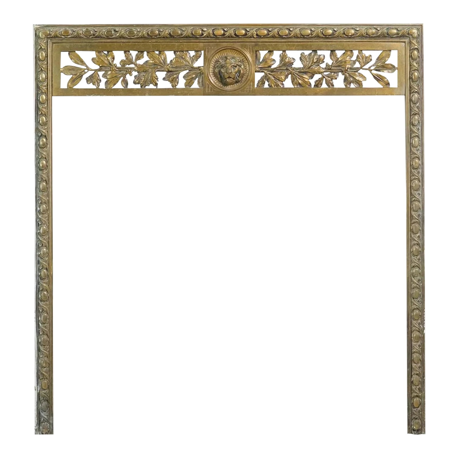 Antique Regency Bronze Fireplace Insert With Lion Head Motif: Bronze Regency fireplace insert with lion head motif. The manufacturer and exact date of creation are unknown. The dimensions are 32.5 in. H x 31 in. W x 0.75 in. D, overall 1.5 in. D. This weighs 11