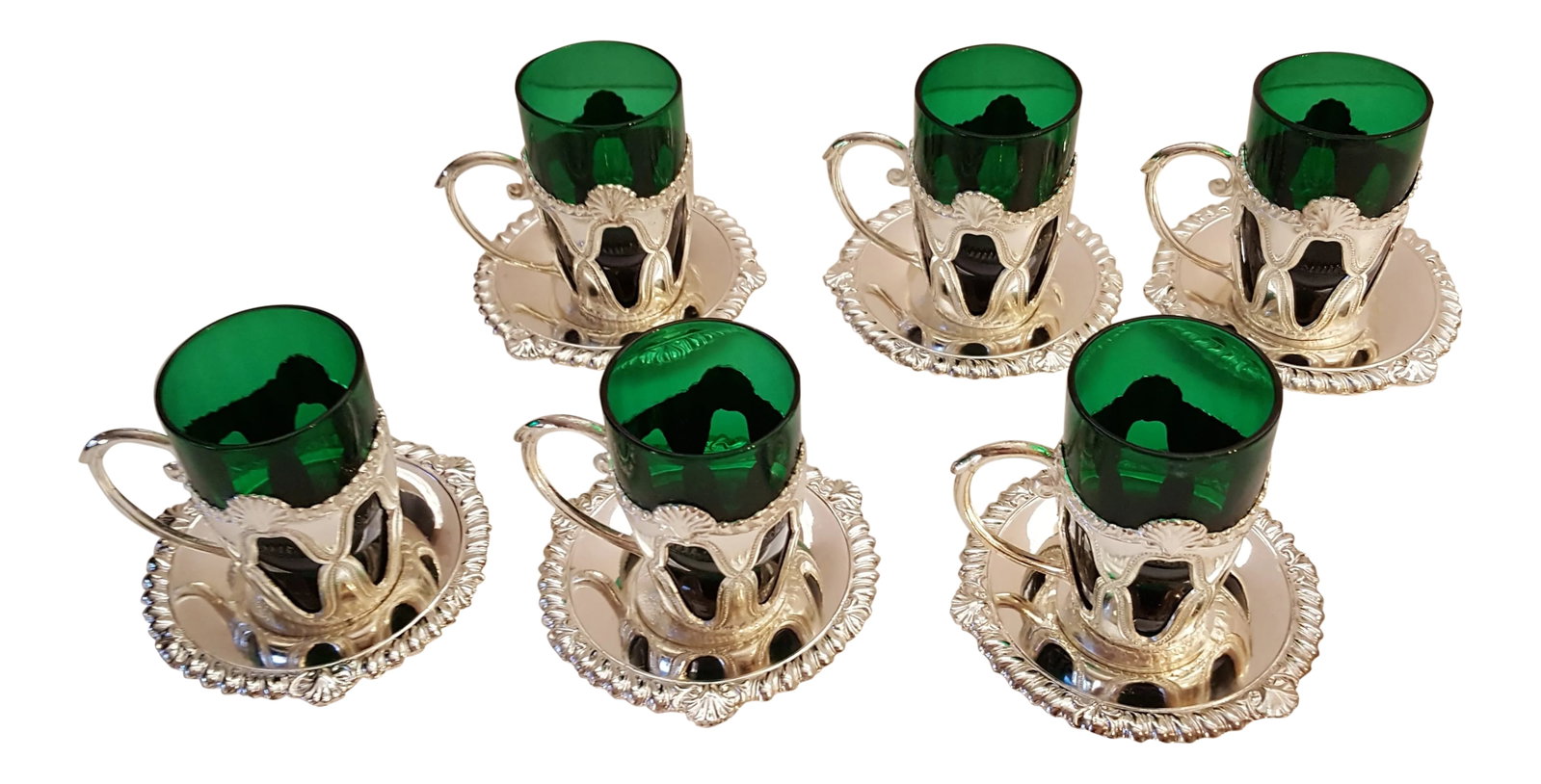 "Ms" Japanese Vintage Silver Bronze 13 Piece Drinking Cups & Saucers - Set of 6: Beautiful, Delicate , Six Brilliant Emerald Green Drinking Cups with Outer Silver Bronze Encasement . Six Silver Bronze Saucers and Original Hardcover Case. This is a Desirable Japanese Collectible.
