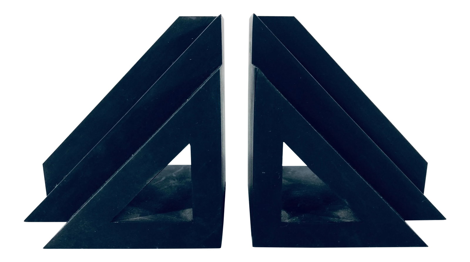 Post Modern Nero "co'modo" Matte Black Rubber Bookends - a Pair: Post Modern matte black rubber bookends made by Nero Japan, 1990s. Condition: Alterations: Original Condition Unaltered Imperfections: Some Imperfections Condition Notes: Excellent vintage condition.