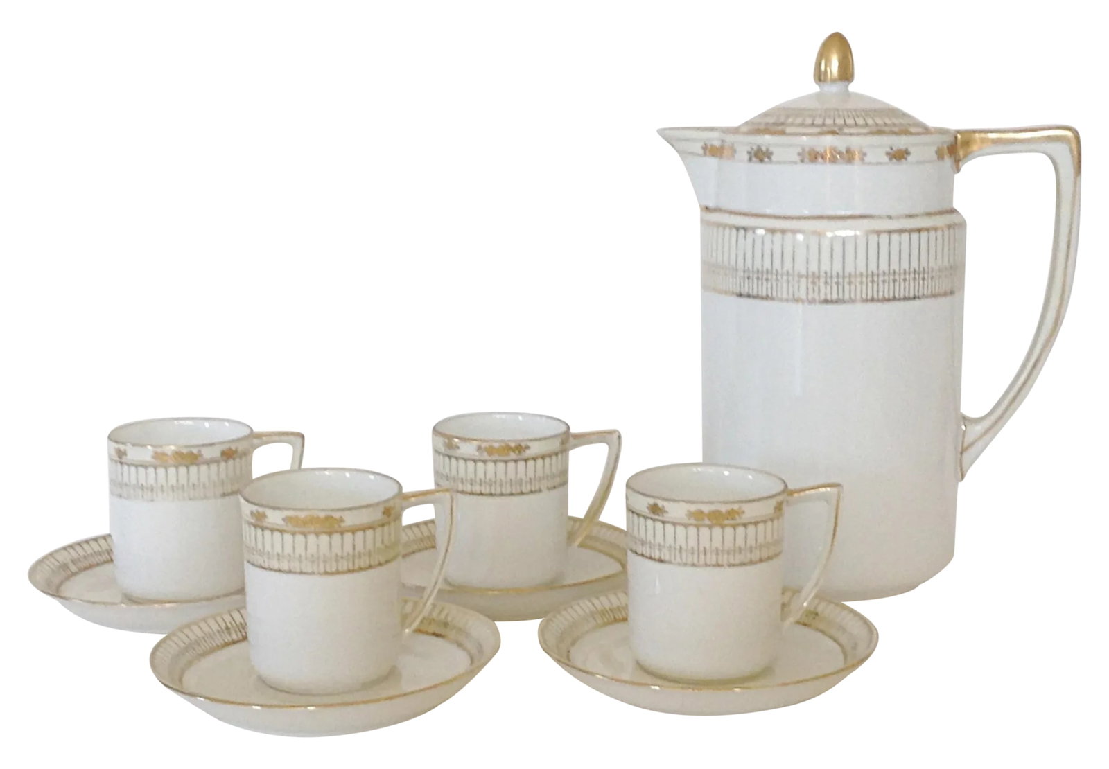 Nippon Porcelain Coffee Service - Set of 9: An elegant MCM Japanese coffee set for four including coffee pot with lid and 4 each cups and saucers. All done in white porcelain with hand painted gold delicate banding made by the Nippon factory