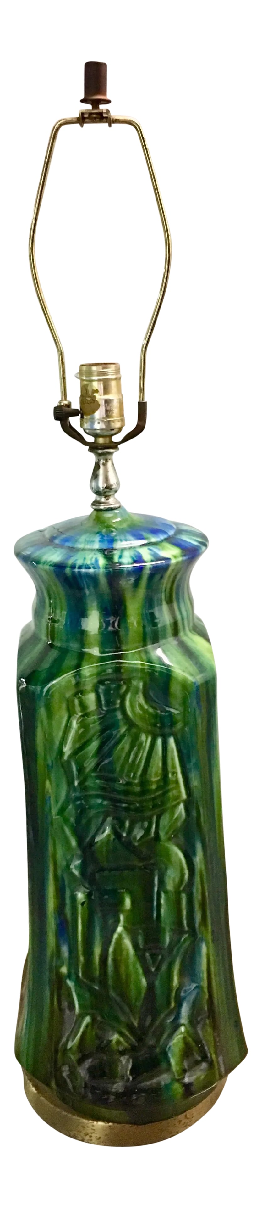 Mid-Century Modern Green & Blue Ceramic Lamp: Mid-century Modern tall polished ceramic lamp in beautiful greens and blues with an intricate design relief on all four sides of the lamp. 27"H to socket 35"H to finial Condition: Alterations: