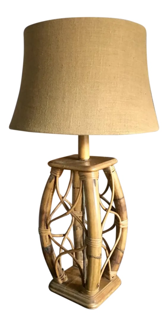Vintage Mid Century Modern Rattan Bended Wood Table Lamp: A mid century bamboo and rattan lamp. Four bentwood bamboo struts are connected with decorative crossed pencil bamboo secured with rattan wrapping. A square maple top and base with rounded corners is