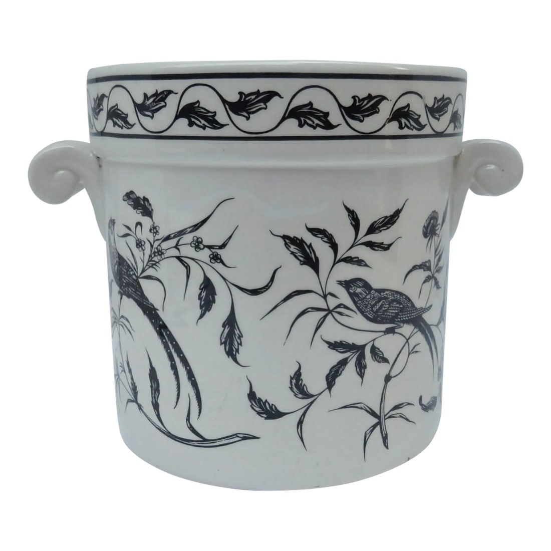 Large Portuguese Hand-Painted Cachepot: A large Portuguese porcelain cachepot accented with black botanical-style flora & fauna decoration on white glaze. Two small handles. Hand-signed underside. Good condition, small glaze flake on rim (s