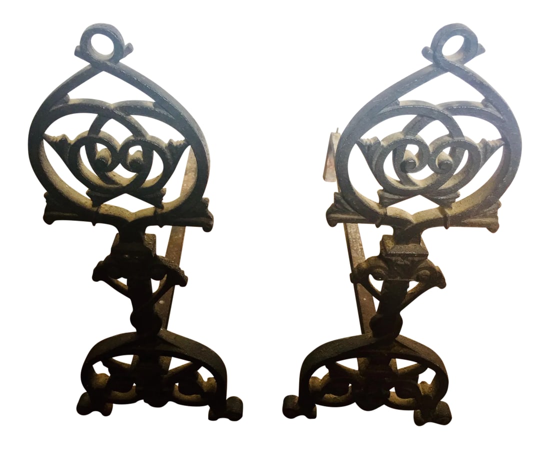 Gothic Revival Iron Andirons - a Pair: Gothic Revival cast iron fireplace andirons/firedogs with Gothic twists and motifs. Dimensions: 8.25" x 22" x 19" 19th Century Collection Spanish Colonial Collection GrpB 9.3 Condition: Alterations:
