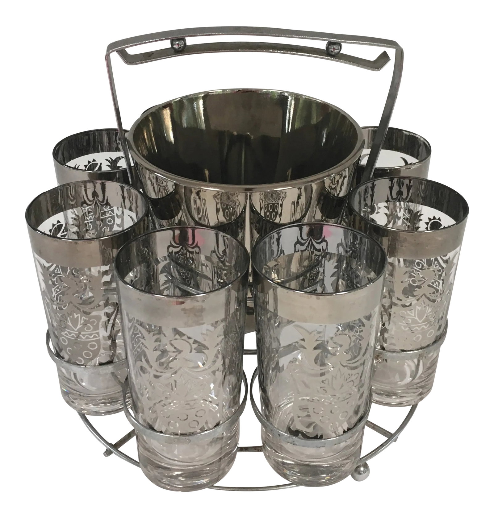 Mid Century Royal Crest Bar Set: Beautiful midcentury set of eight silver ombre tall collins glasses with a matching silver ice bucket and caddy. This set would make a dramatic statement on your bar. Dimensions: ice bucket, 6"Dia x