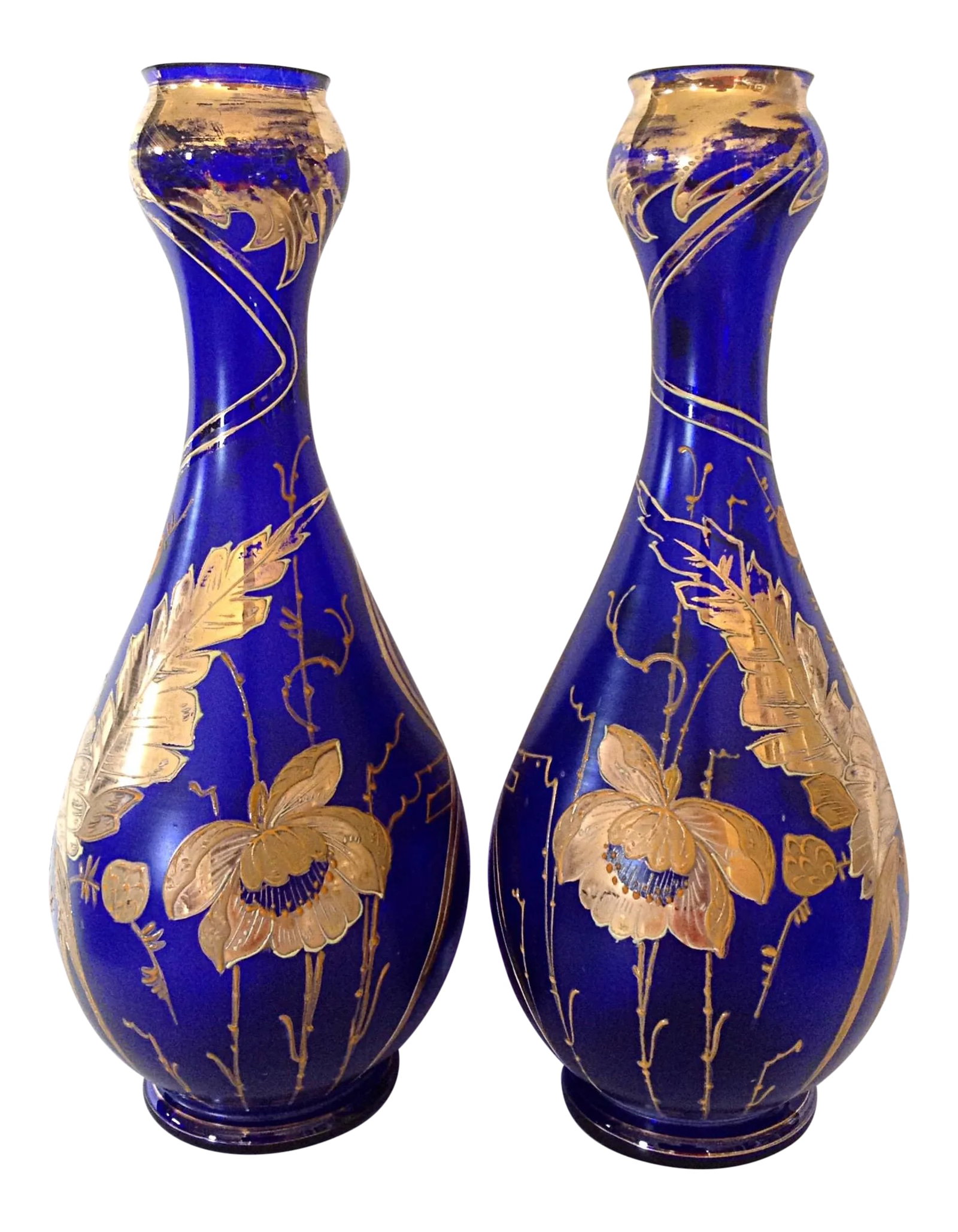 Signed Moser Cobalt Art Nouveau Vases - Pair: This elegant pair of art nouveau art glass vases made by the Moser company in Austria in cobalt blue wrapped with vines of floral motif. The slogan King of Glass, Glass of Kings is associated with