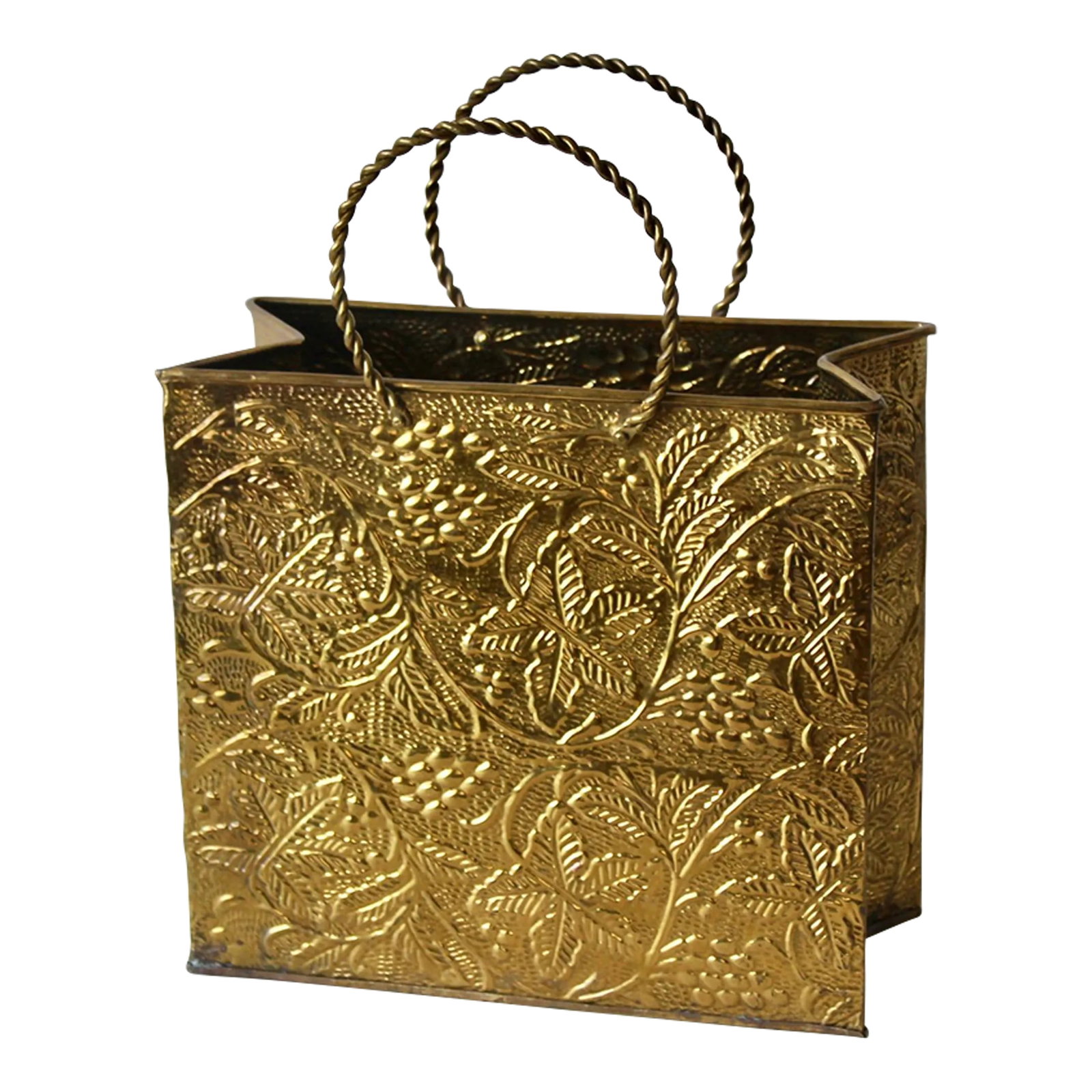 1970s Sarreid Ltd Style Embossed Brass Shopping Tote Bag Magazine Holder: Sarreid Ltd Style Embossed Solid Brass Shopping Tote Bag Magazine Holder. In vintage condition with a small dent in one corner, some pitting and surface marks. Shiny and bright. Condition: