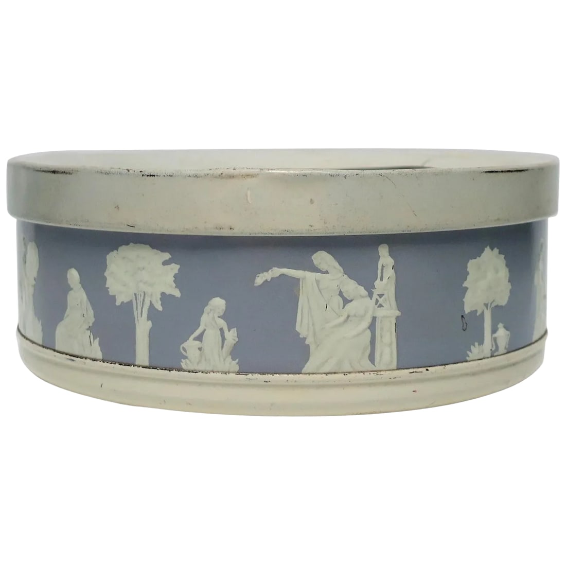 Neoclassical Round Box in the Style of Wedgwood: A beautiful and rare early to mid-20th century matte white and grey or light periwinkle blue round metal box in the Neoclassical style. The Neoclassical raised relief design around box's exterior