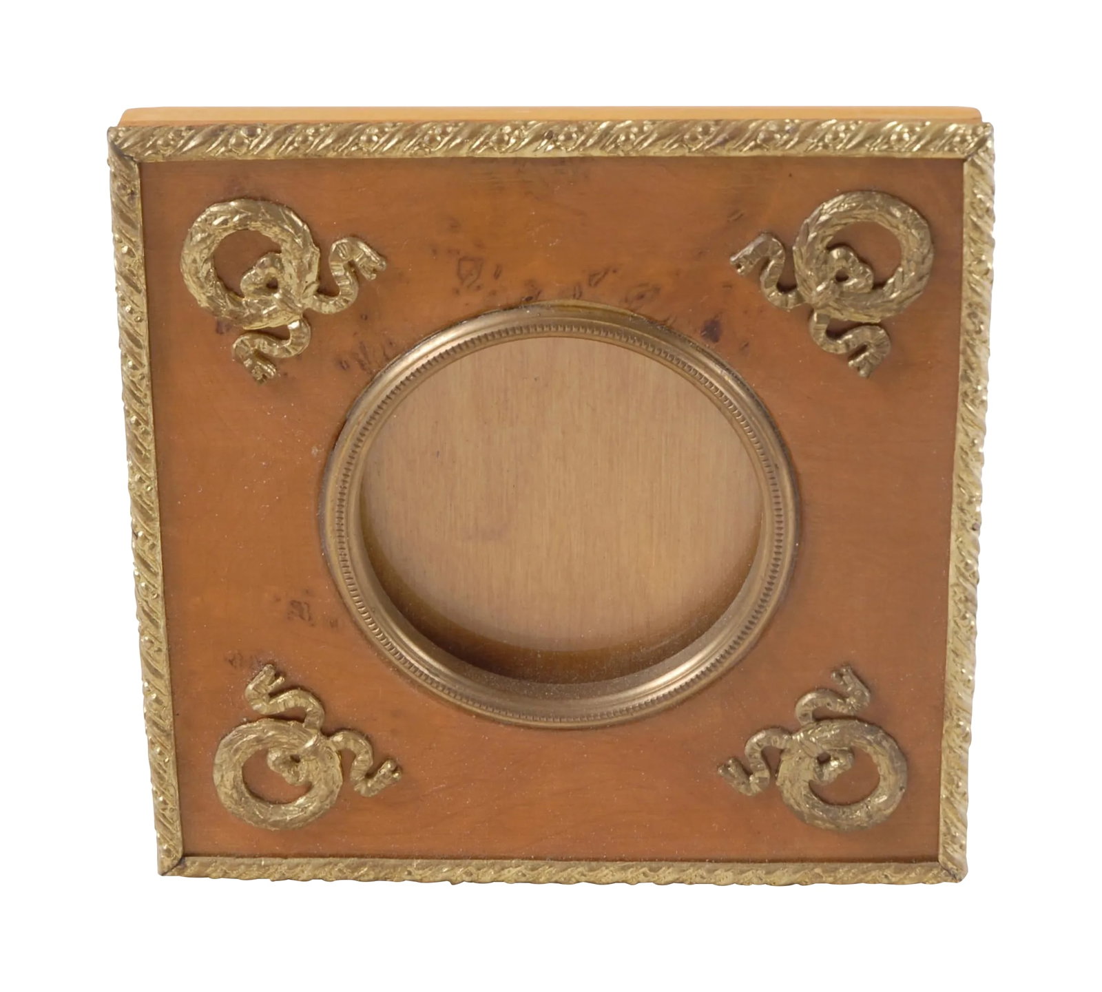 1900s Bronze Dore Burled Elm Picture Frame: Bronze dore and burled elm picture frame, with an easel back in the French Empire taste with wreaths and leaves. Picture opening 1.75". 19th Century. Condition: Alterations: Original Condition