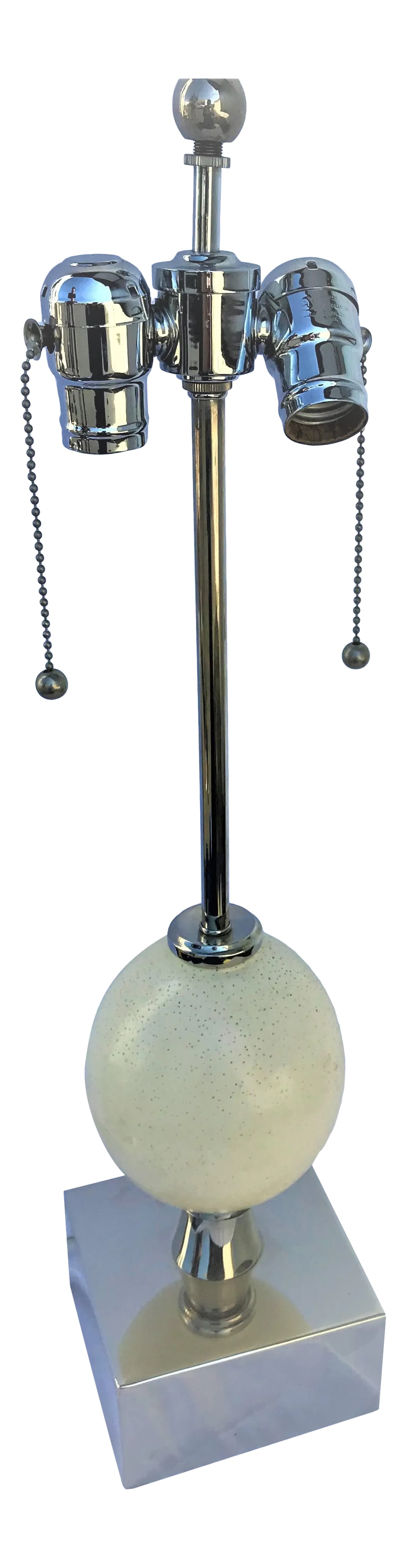 Ostrich Egg Silver Finish Deluxe Sockets Table Lamp: A real Ostrich Egg, drilled for a lamp base. Great looking. Real egg Silver finish base and metal parts. A deluxe double light cluster body with pull chains. Custom designed and made for a Lighting
