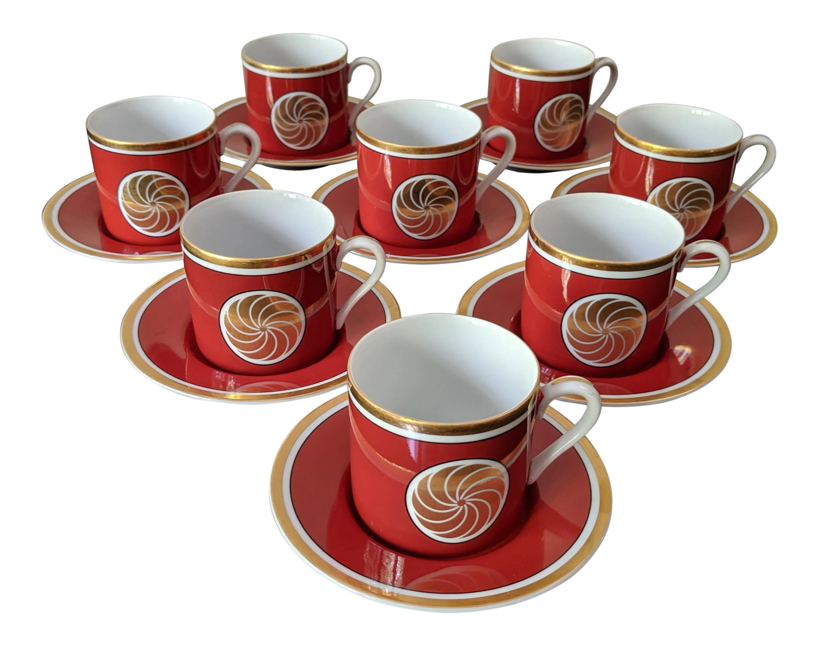 Fitz & Floyd Medaillon Orange d'Or Coffee Service - Set of 8: An elegant and timeless coffee set by Fitz & Floyd. The Medallion d'Or pattern was produced from 1976 to 1980. This set of 8 porcelain cups and saucers have thick gold trim, a gold center medallion, a