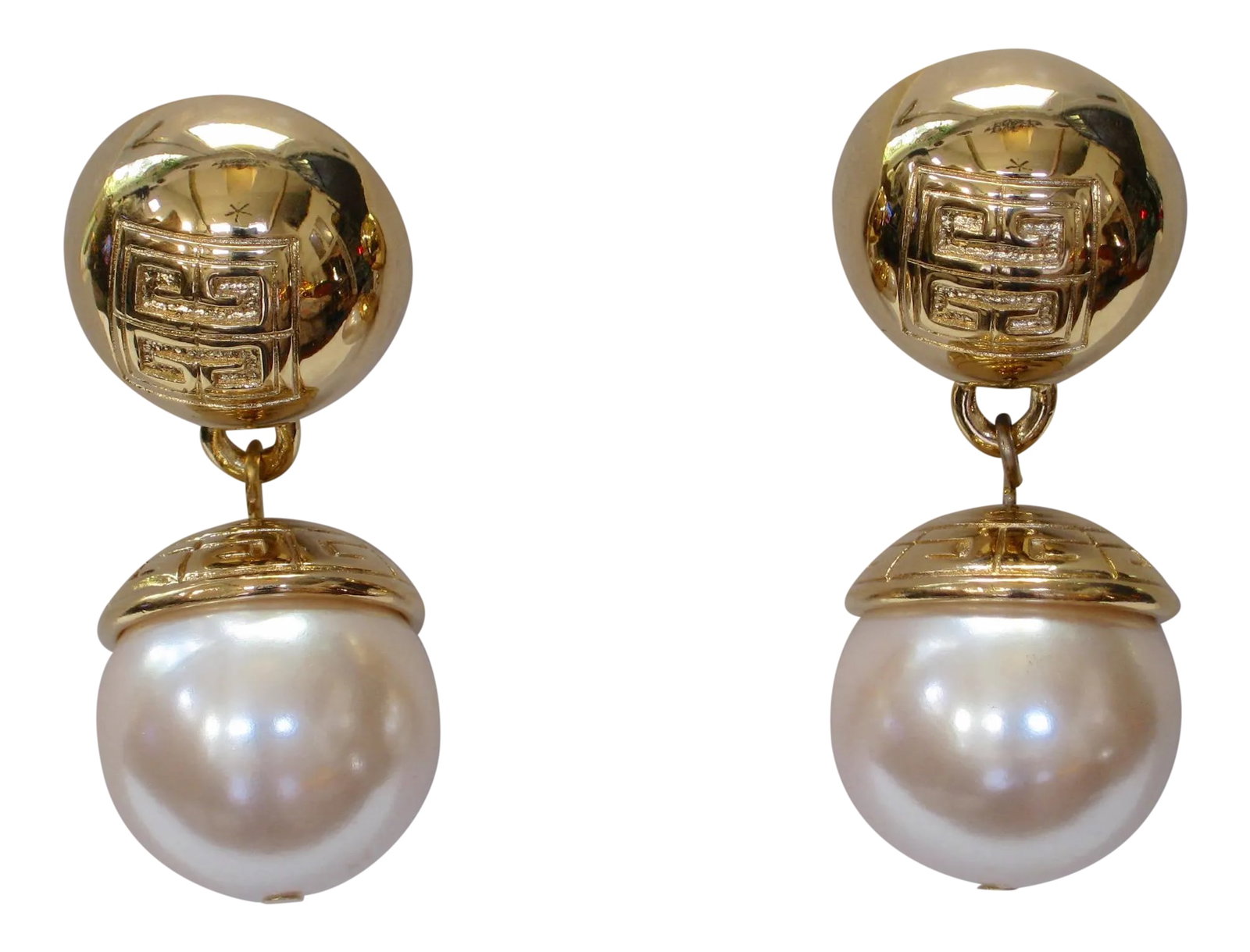 1970s Givenchy Gold-Plated & Glass Pearl Drop Earrings, 2 Pieces: 1970s Givenchy signature gold-plated glass pearl carved drop earrings with comfort clip backs. Signed ; "Givenchy, Paris, New York" From my private collection, never worn. I have been collecting high