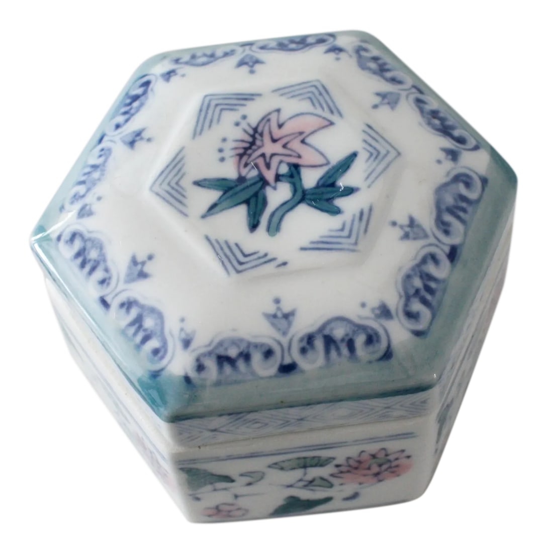 Blue, Pink and Green Floral Hexagon Ceramic Trinket Box: Adorable little ceramic, hexagon shaped trinket box! Vintage from the 1970's-80's with floral and geometric motifs in blue, light green and blush pink on white. Perfect on a desk, nightstand or