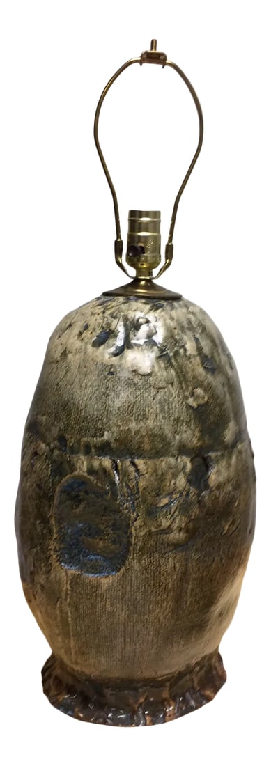 Late 20th Century Abstract Ceramic Pottery Lamp: One of a kind ceramic pottery lamp. Perfectly imperfect abstract textured design. Artist's signature on base. Does not include a lamp shade, includes harp Condition: Alterations: Original Condition