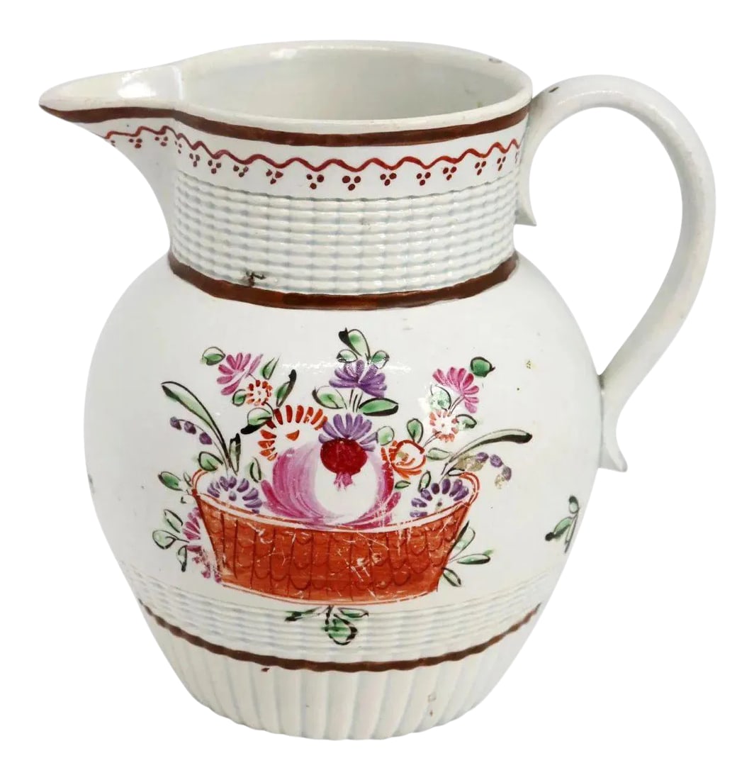 English Georgian Creamware Flower Basket Cream Pitcher: MARKS Unmarked PERIOD George III (1760-1820) | Late 18th century DATE Circa 1790 Condition: Alterations: Unknown Imperfections: Some Imperfections Condition Notes: Note: antique item. Shows