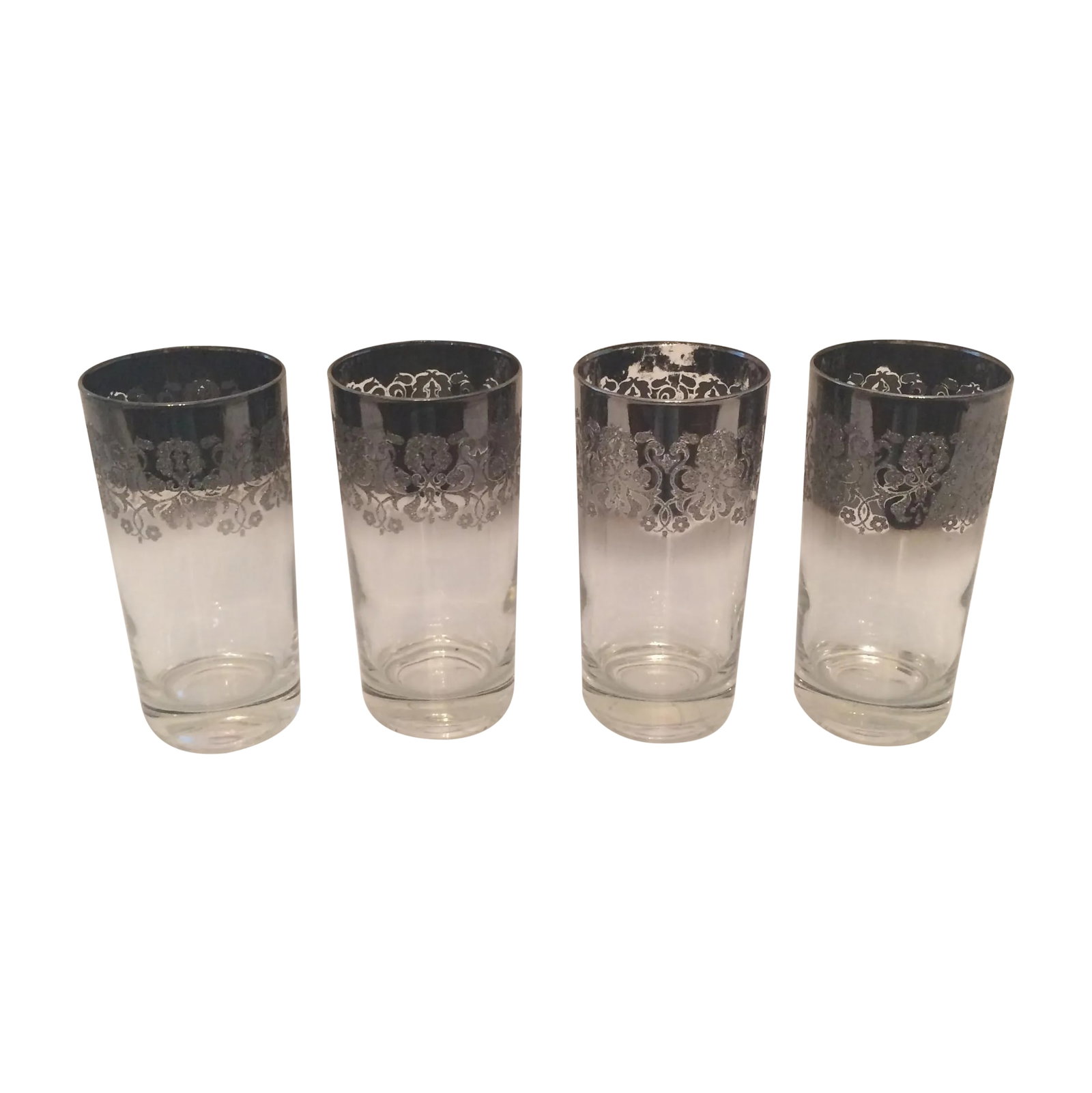 Dorothy Thorpe Ombre Embossed Glasses - Set of 4: Offered is a set of 4 highball style bar glasses by mid century queen Dorothy Thorpe. The glasses are a silver to transparent ombre, and they are embossed with beautiful elegant details. Condition: Al