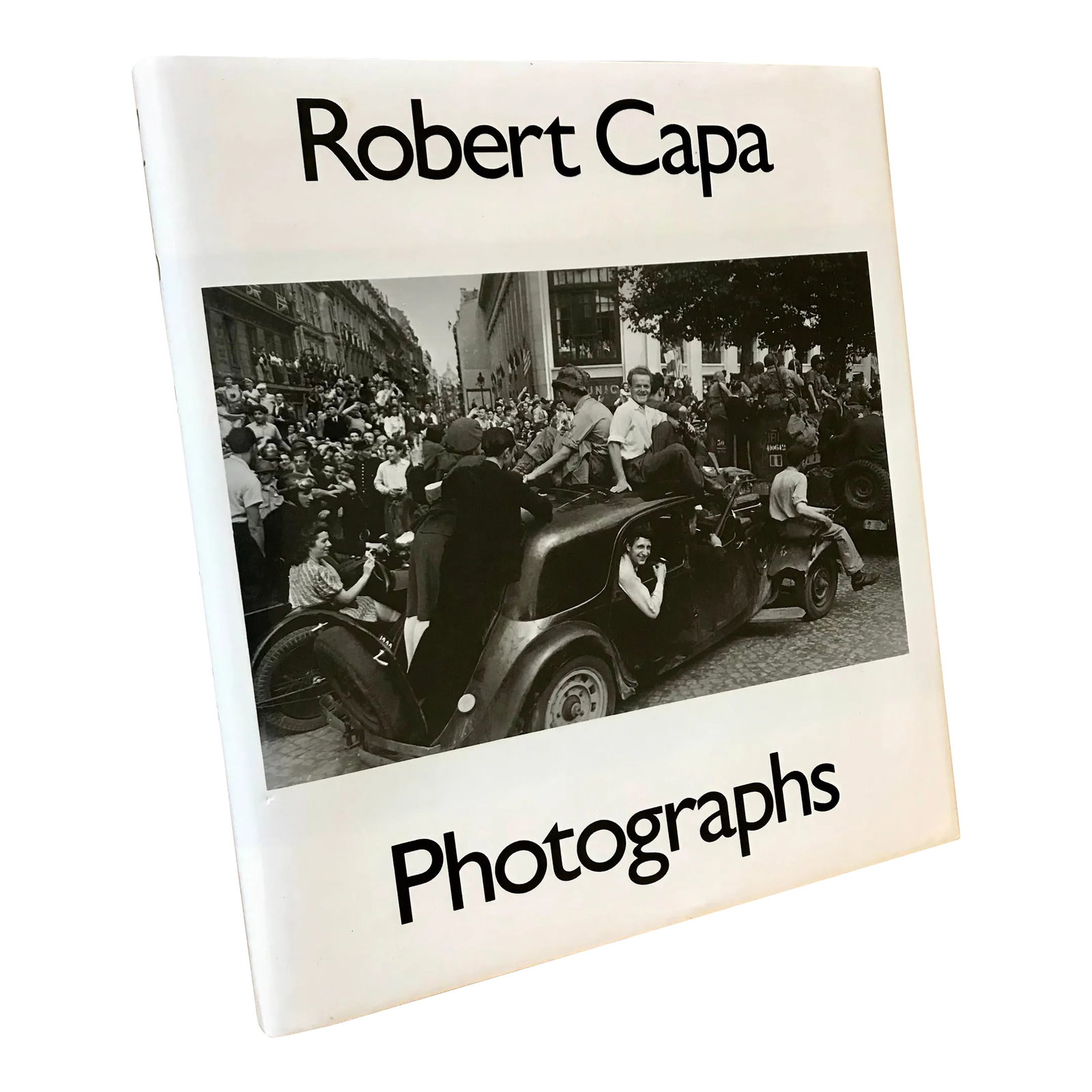 1980s "Robert Capa Photographs" Hardcover Book: Hardcover book with dust jacket. Made in the 1980s. Condition: Alterations: Original Condition Unaltered Imperfections: Some Imperfections Condition Notes: Good condition. Origin: United States