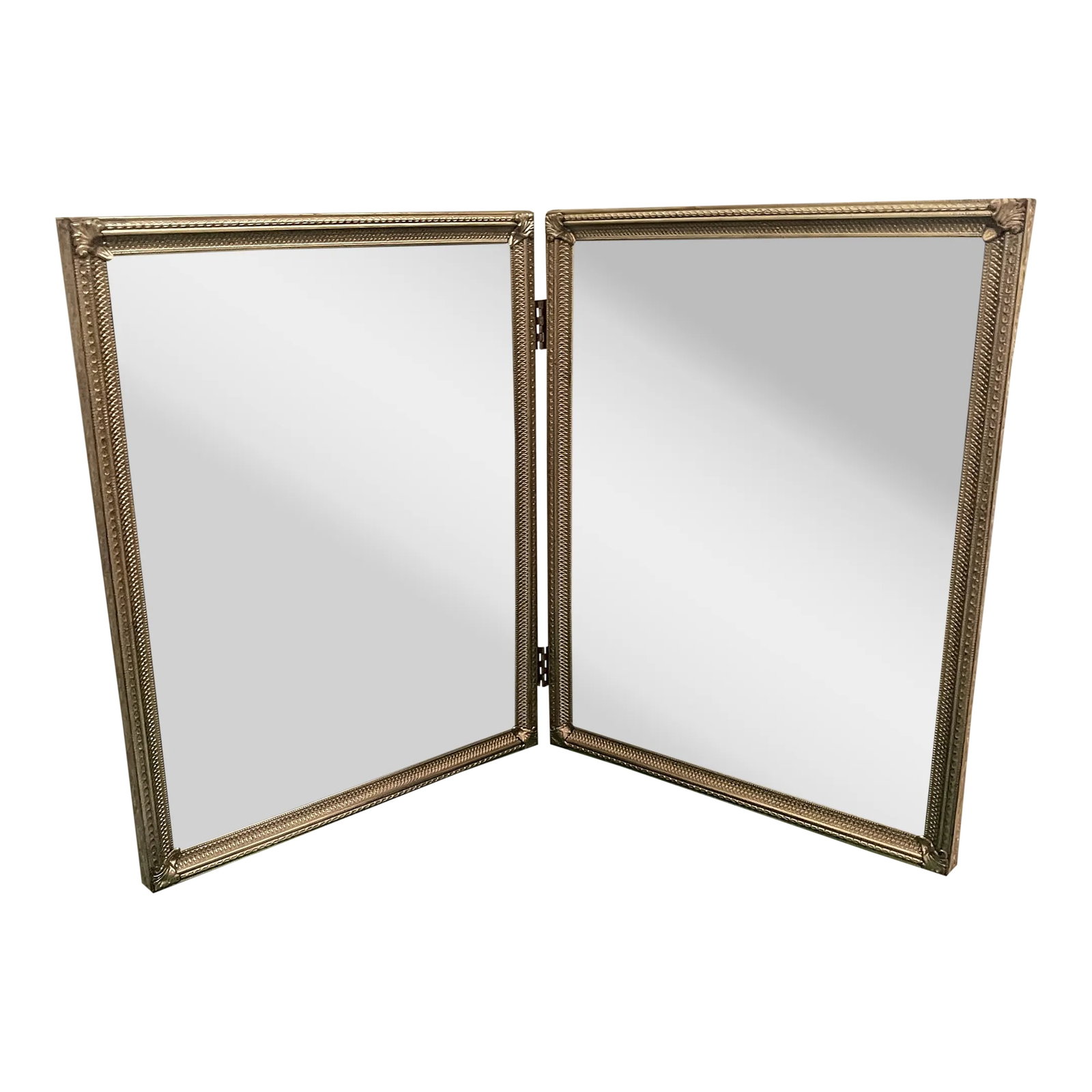 Vintage Double Swing Large Frames With Delicate Carving: Delicate carved brass frames with double swing in the center. The brass frame is nicely carved and is in good condition except for few small dents. The hinges are intact and the backing is a flat