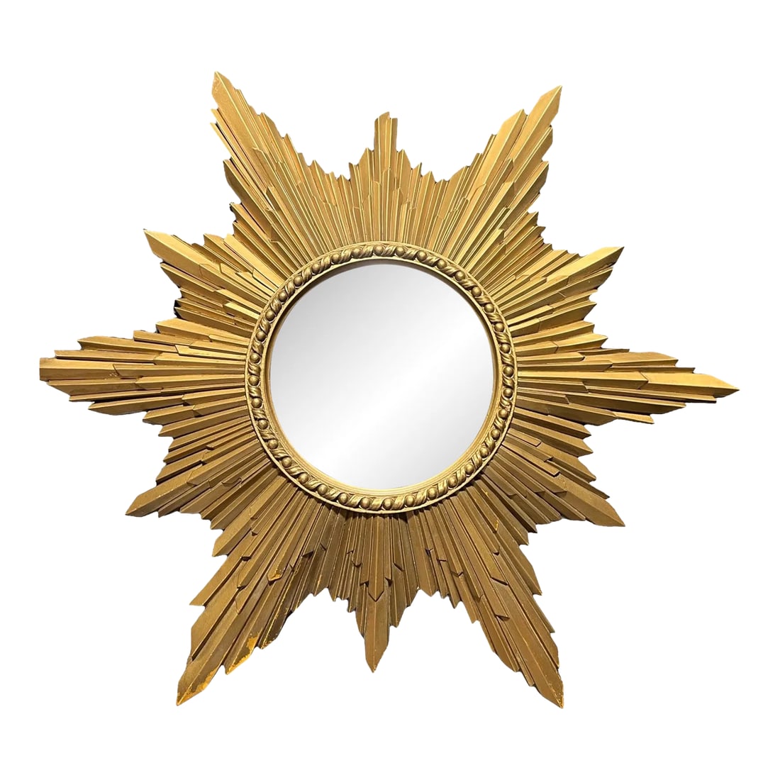 1960s Syroco Wood Sunburst Convex Wall Mirror: A decorative Hollywood Regency sunburst wall accessory with original finish and a 7.5" convex mirror. Circa 1960 with original label from Syroco Wood. Condition: Alterations: Original Condition Unalte