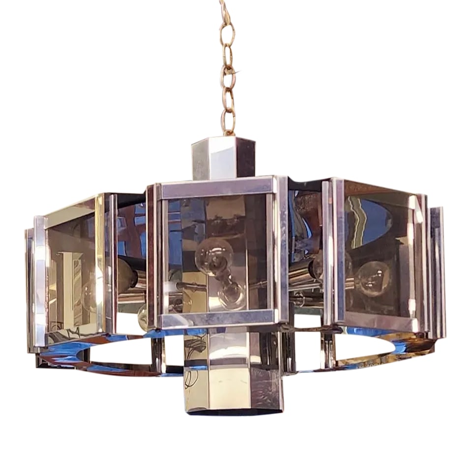 1960s Mid-Century Modern Chrome and Glass Fredrick Ramond Chandelier: Mid Century Modern chrome and tinted glass chandelier. Fredrick Ramond beautiful lighting. All of the bulbs are in. 1960's chrome and smokey glass are the quintessential look for the mcm lovers.