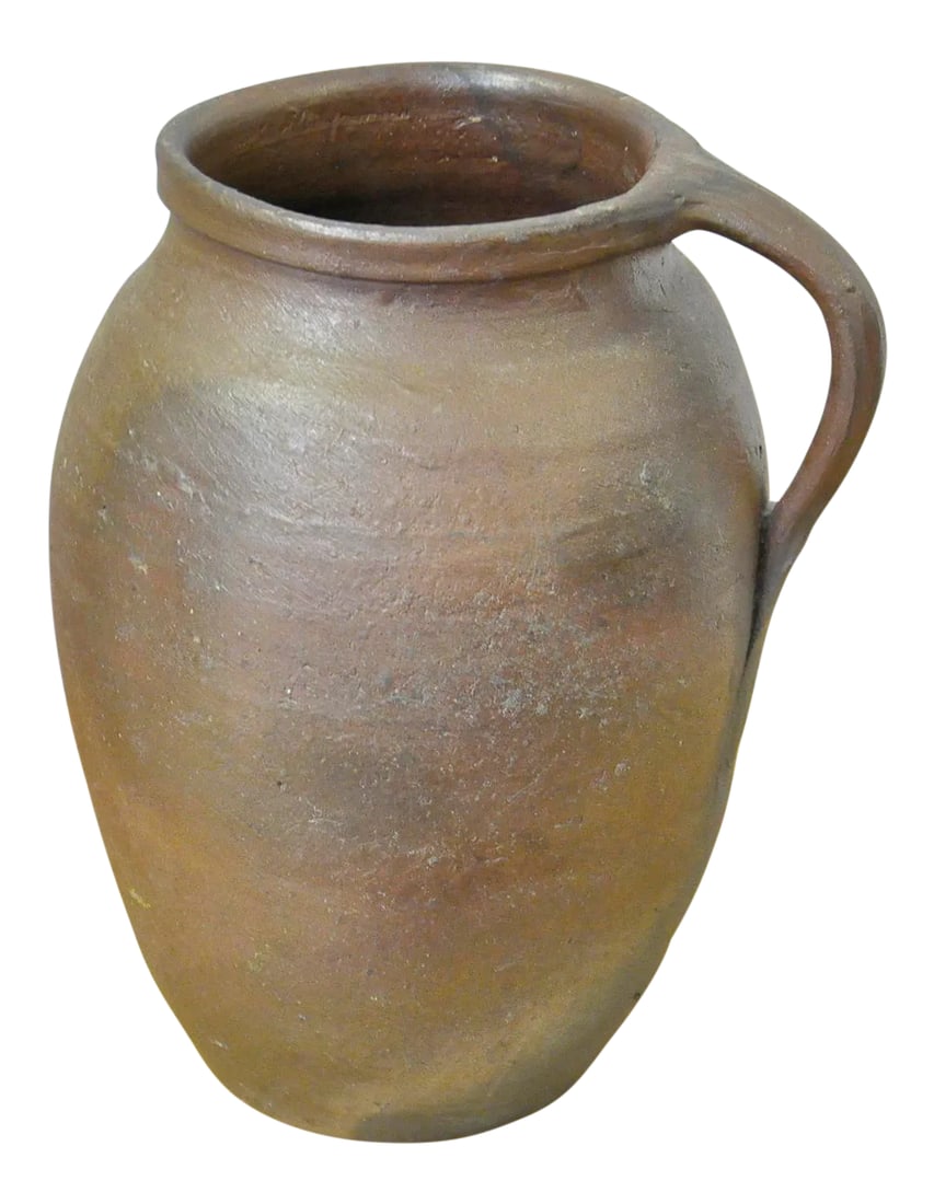 Vintage French Stoneware Jug: Vintage French Stoneware jug from the Brittany region of France. Hand-made and unglazed. These jugs were used on the dairy and apple farms. Beautiful color variation from the firing process.