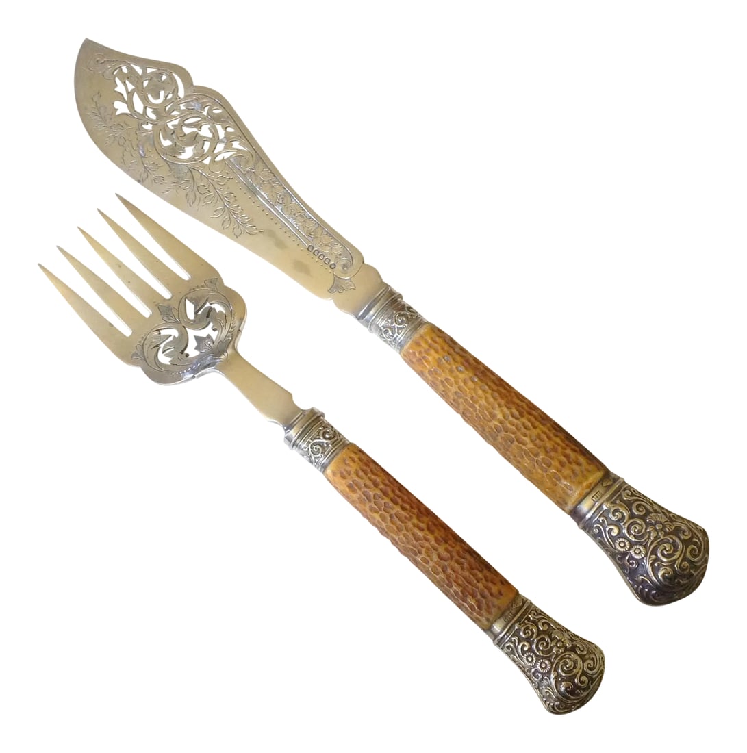 19th C. English Fish Servers, Pair: This beautiful 19th C. set of fish servers is by the British firm Harrison Brothers & Howson Cutlers To Her Majesty, Sheffield. The handles are embellished with silver at both ends. Heavy engraving of