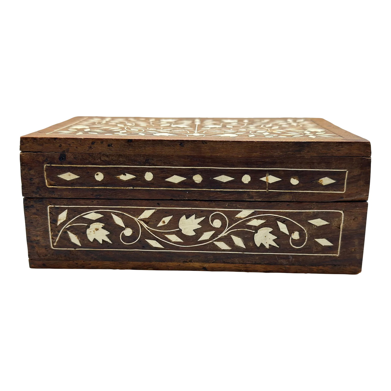Indian Inlaid Wooden Box: Intricately inlaid small decorative box. Made in India. Some imperfections consistent with age. Hinged top appears to be handmade. Beautiful decorative piece. Wooden box with wooden inlay Condition: