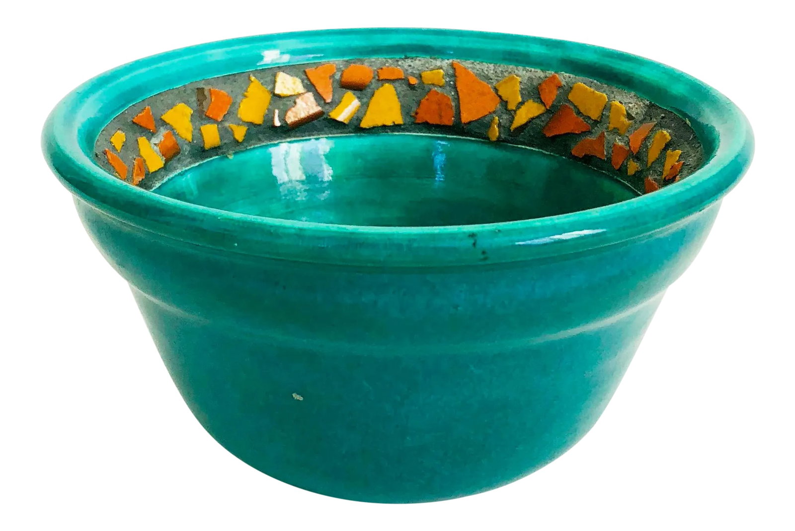 Vintage Green and Orange Handmade Pottery Bowl: A sweet vintage handmade pottery bowl. Perfect for display or using as a catch all. Bright blue-green glaze with unique edge detailing of embedded orange and yellow pieces of pottery. Condition: