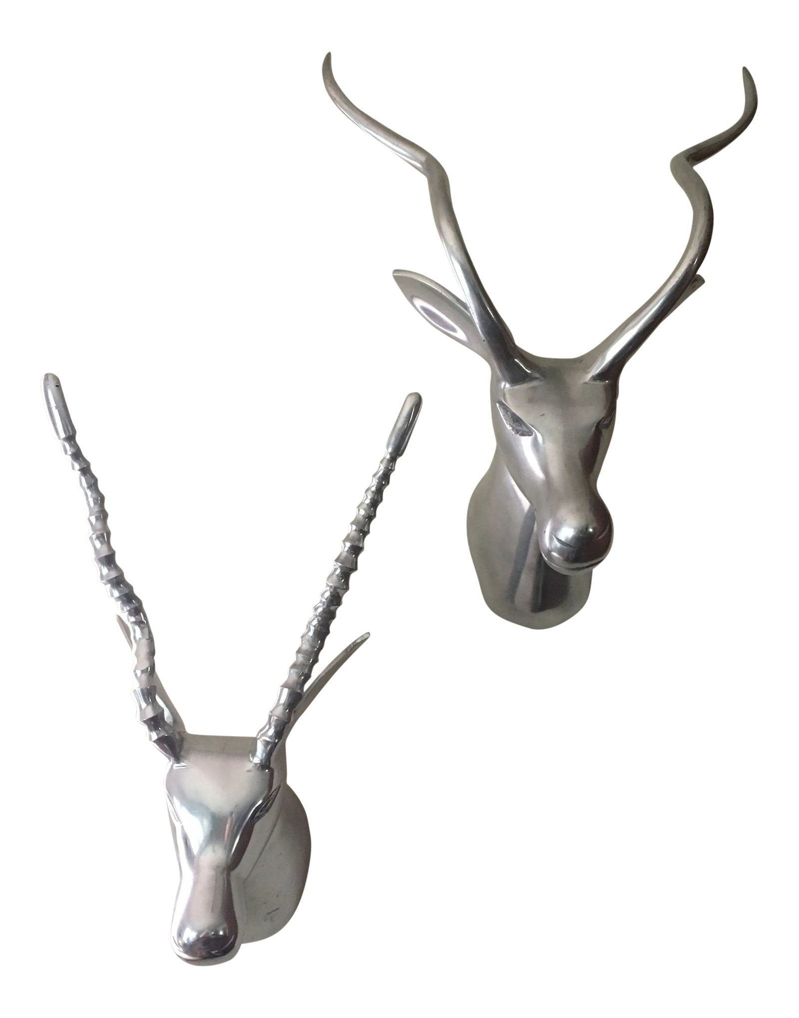 Wall Mounted Metal Heads/Horns - a Pair: Pair of decorative mounted horns/heads. Made of metal, silver color, easy to hang in any room. Condition: Alterations: Original Condition Unaltered Imperfections: Some Imperfections Condition Notes: u