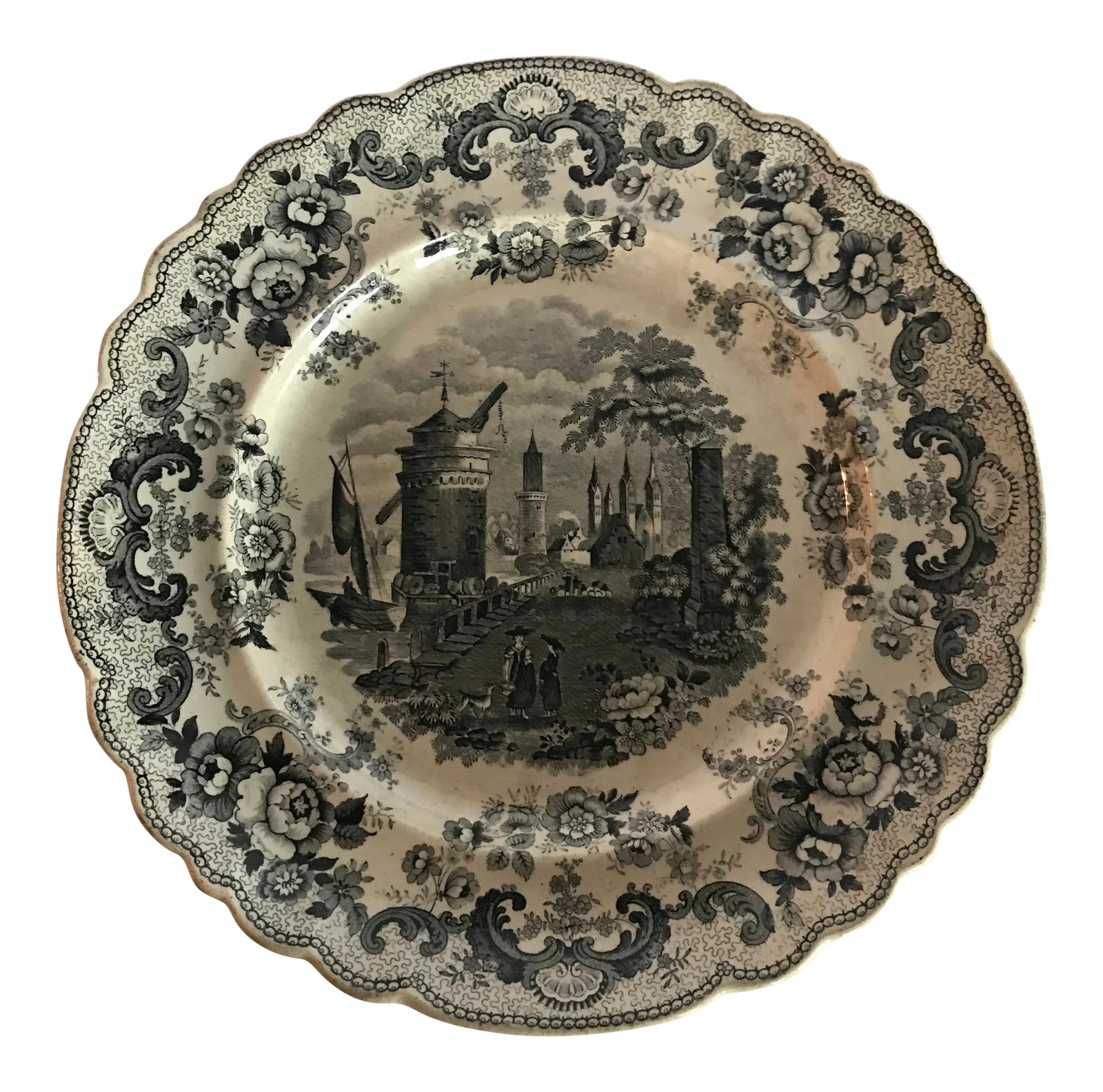Antique Decorative Transferware Plate: Transferware plate featuring a traditional scene. A beautiful decorative accent! Perfect for your cabinet. Condition: Alterations: Original Condition Unaltered Imperfections: Some Imperfections Condit