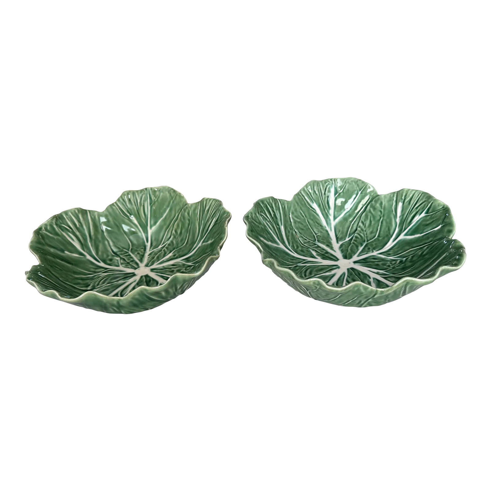 Bordallo Pinheiro Cabbage Serving Bowls - Set of 2: These vintage Bordallo Pinheiro cabbage bowls are the perfect size for serving a salad, vegetables or fruit. Measures 9.25" across and 3" tall and each has a barely noticeable minor chip on one and a