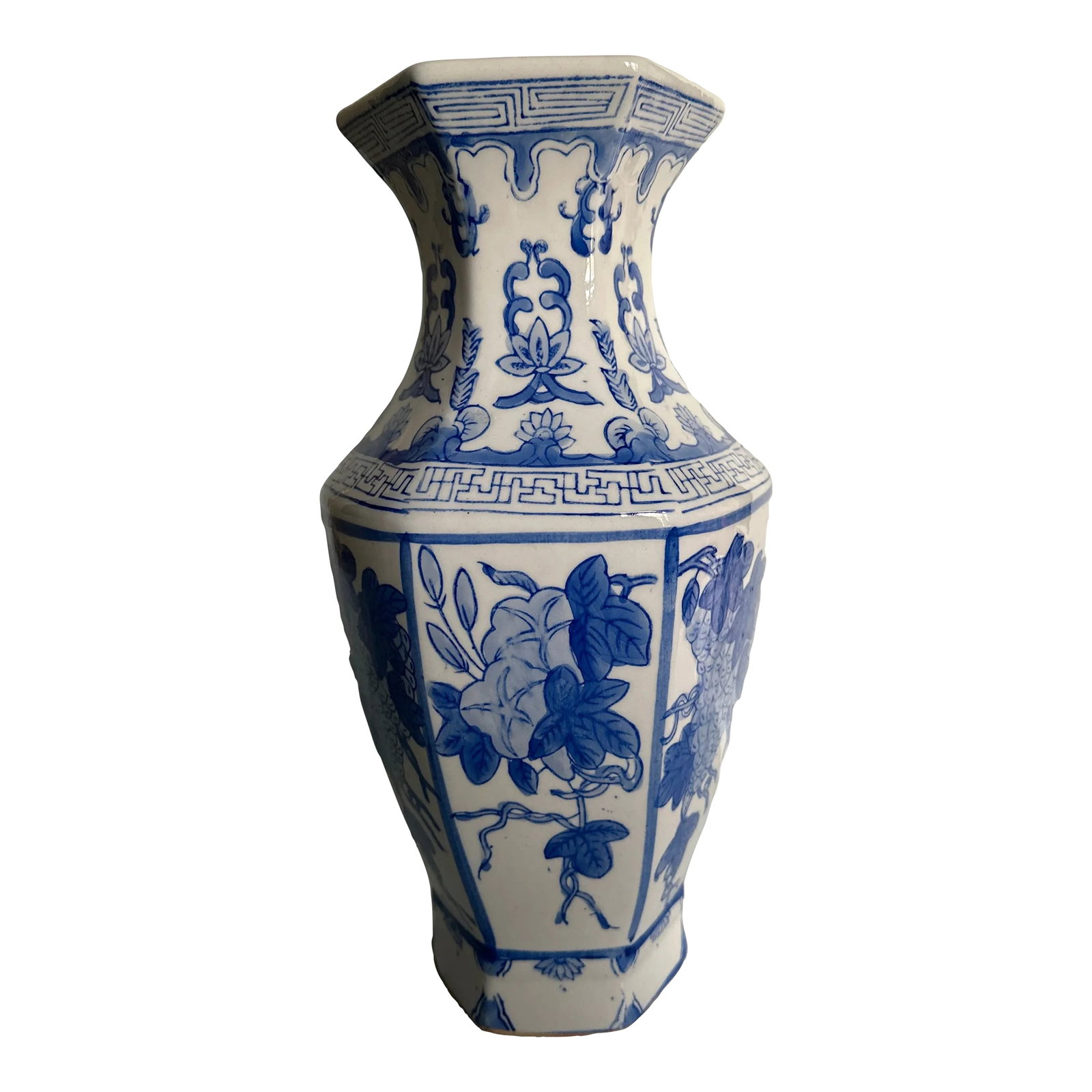 Vintage Ceramic Blue White Chinoiserie Greek Key Tall Vase: A beautiful Chinoiserie blue and white tall vase with pretty greek key trim. The vase is perfect on its own or filled with your favorite flowers. The vase is heavy Country of origin unknown there are