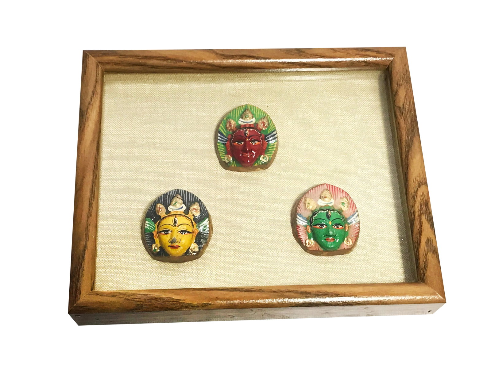 Vintage Mid-Century Hand Painted Shiva Third Eye Sculptures Framed in Shadow Box: Vintage mid century hand made and hand painted shiva third eye sculptures framed in a beautiful shadow box. This piece features three hand made and hand painted Shiva faces with distinct third eyes. T