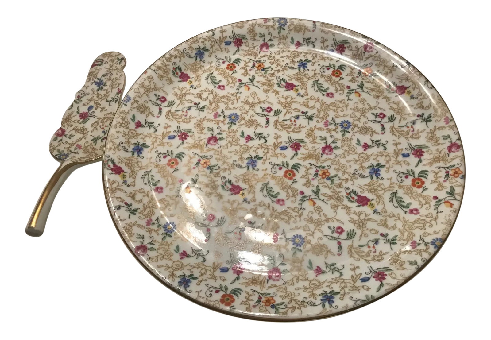 Limoges Early 20th Century VintageFloral With Gold Edged Plate and Matching China Serving Utensil -: Very unique set - a fine china porcelain ~ 12" diameter Cake Plate & server, from NY estate, I have had & displayed over 40-50 years. These items are in excellent condition, no chips or defects. It