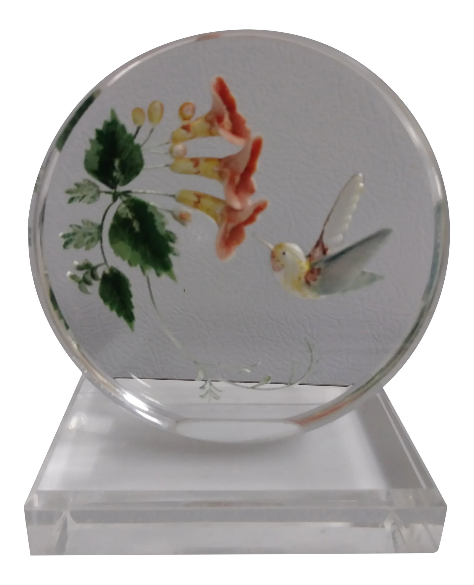 Carved Hummingbird and Honeysuckle Vine Lucite Paper Weight: This Reverse Carved Acrylic Paperweight and/or Sculpture has a colorful hummingbird enjoying the sweet nectar of pink and yellow flowers on a green vine. Condition: Alterations: Original Condition
