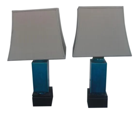Vintage Blue Rectangular Ceramic Lamps With Asian Floral Etched Design and Silk Shades - a Pair: This stunning pair of vintage, vibrant blue ceramic lamps with a delicate Asian flower etched design sitting on a chunky dark wood base. Each lamp has an adjustable height, double bulb sockets and a