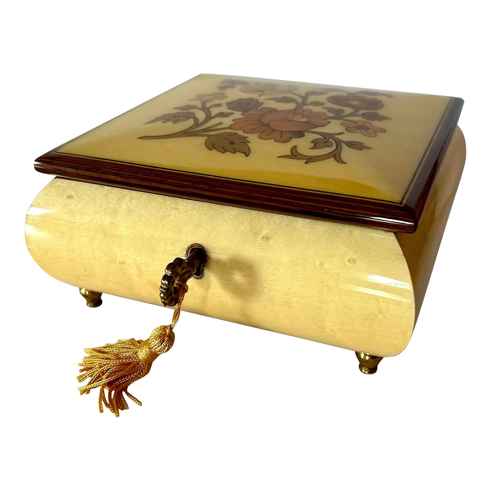 Italian Reuge Yellow Music Jewelry Box: Beautiful details throughout on this lovely Reuge Italian music box. Pale yellow box topped by a floral inlaid design lid that has been framed in brown. Locking key with tassel. Interior in light rose