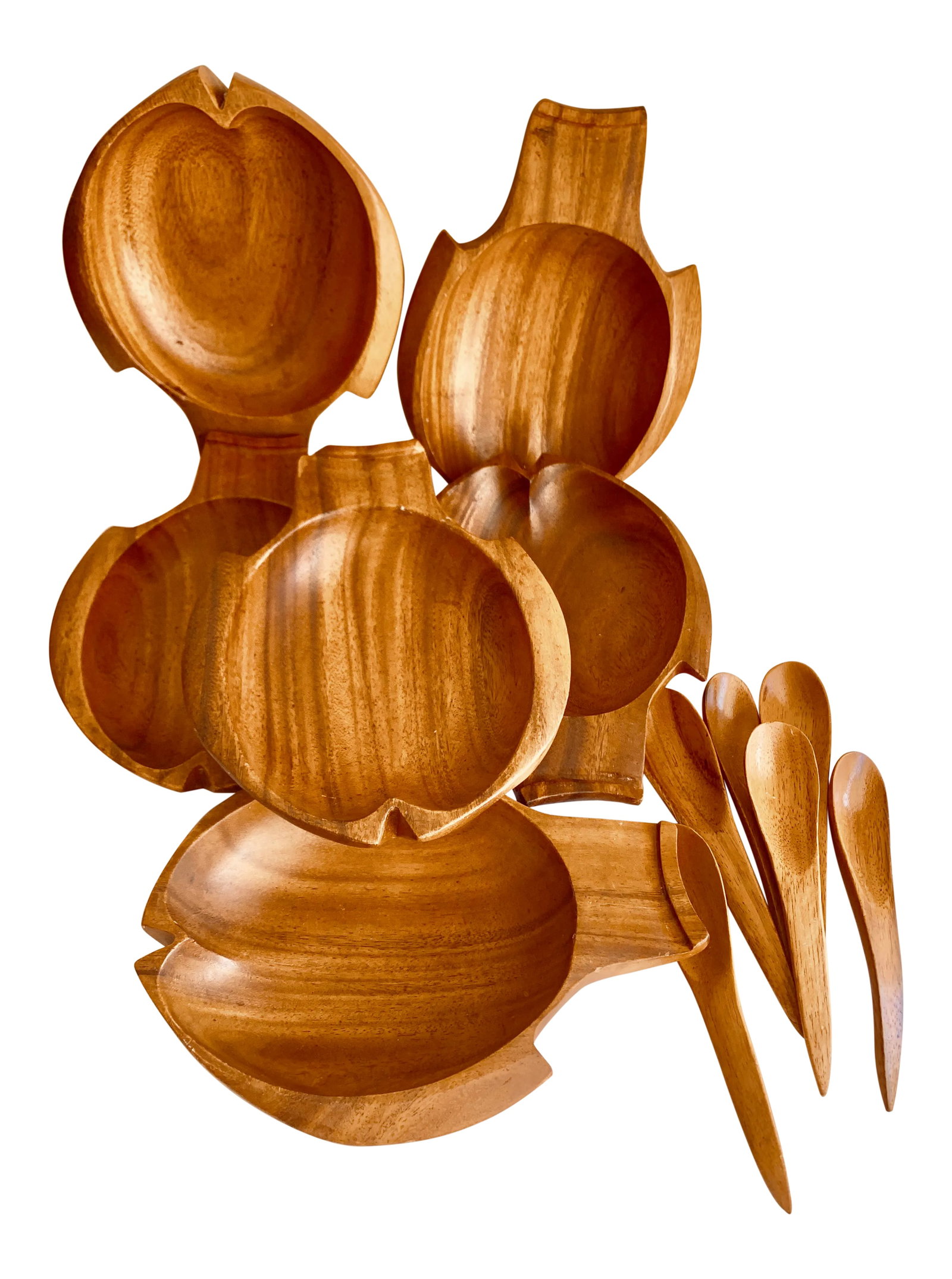 Fish Shaped Monkey Pod Wood Bowls & Spoons: Polynesian carved genuine monkey pod bowls and spoons. Set of twelve. Rustic elegance and natural simplicity with natural wood grain and fish shaped design. Tiki party on the patio? Condition: