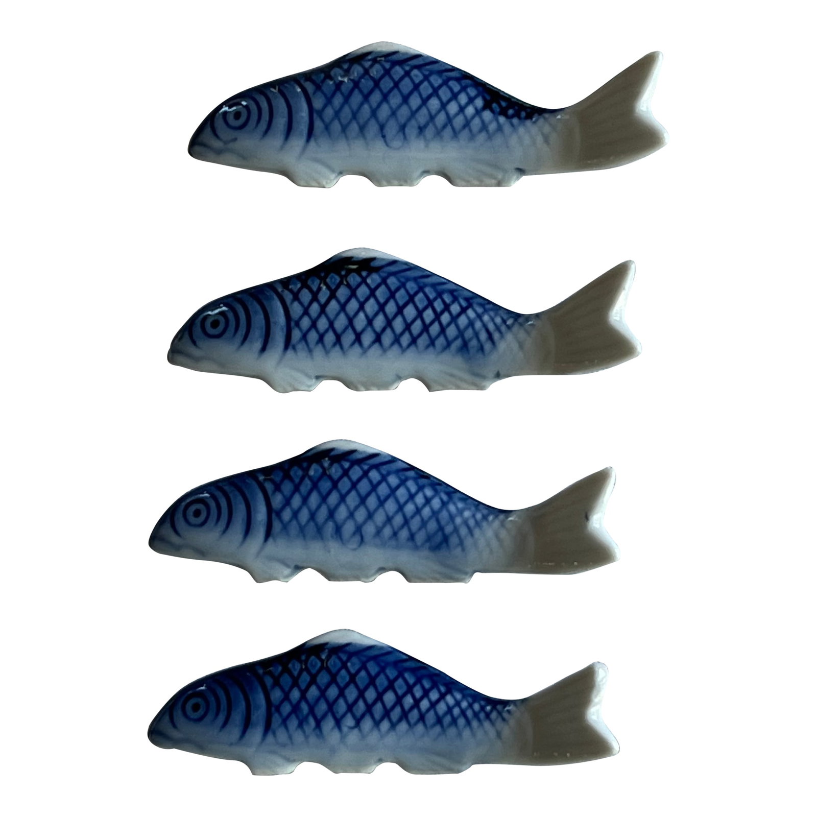 Blue & White Chinoiserie Fish: Four blue and white chinoiserie fish chopstick holders. Could also be used for decoration or as an addition to your collection. Combined shipping with all other items in my shop. Condition: