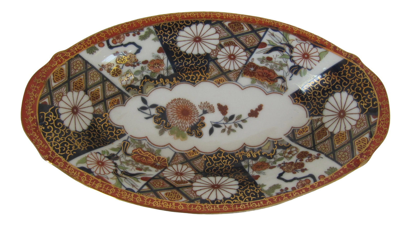 Oval Chinoiserie Blue & Orange Serving Bowl: Beautiful blue, gold and burnt orange chinoiserie serving bowl. Perfect for nuts, candy and more. Coordinating pieces available. Combined shipping available. Condition: Alterations: Original