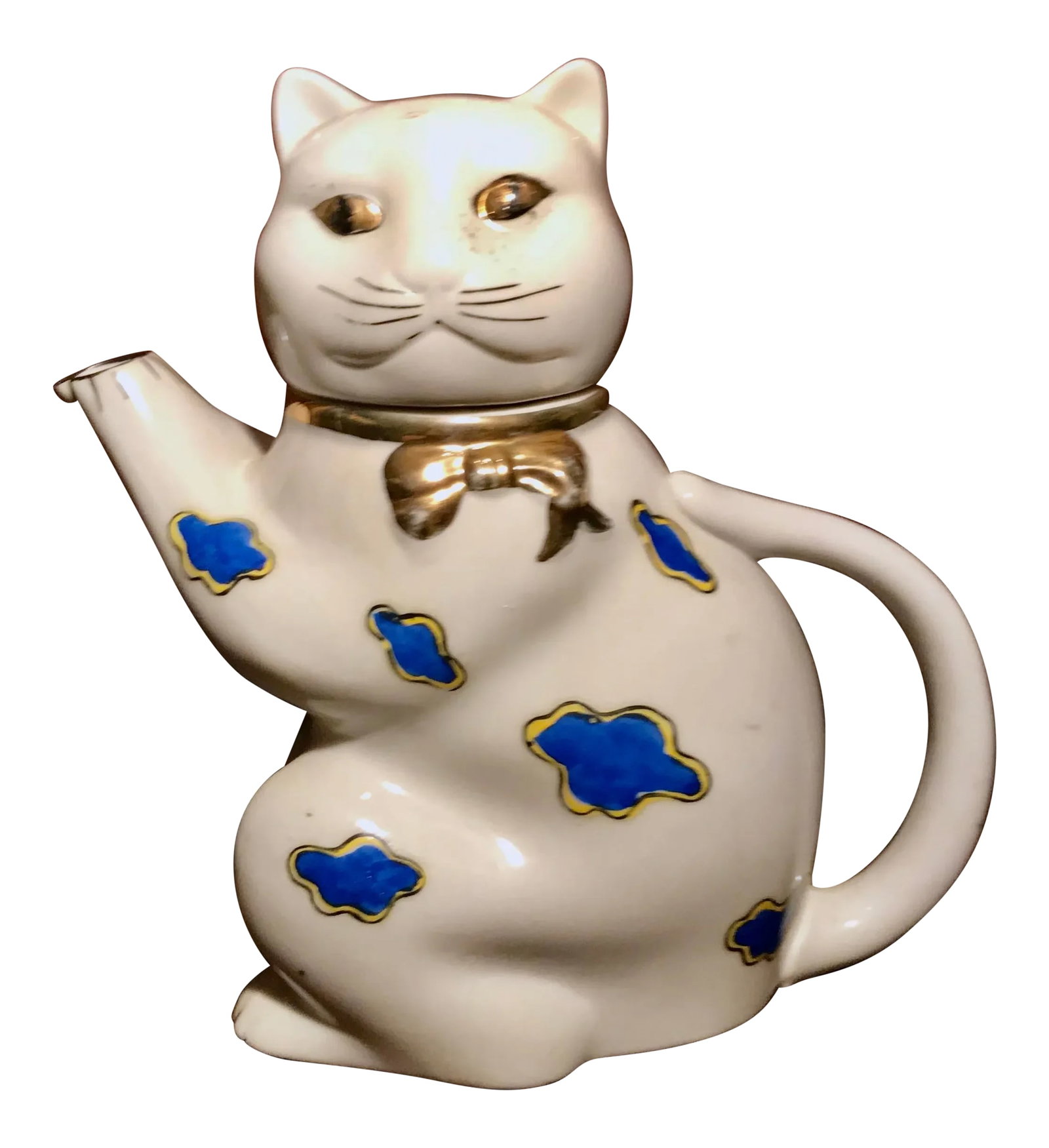 1950's Gold Castle Chikusa Japan Hand Painted White and Gilded Gold Trimming Cat Teapot: 1950's Gold Castle Chikusa Japan porcelain Cat tea port. Hand painted and gilded gold trimming. Color: white, blue and gold Size: approx 8" tall and 7" wide Condition: no chip or cracked A few spots